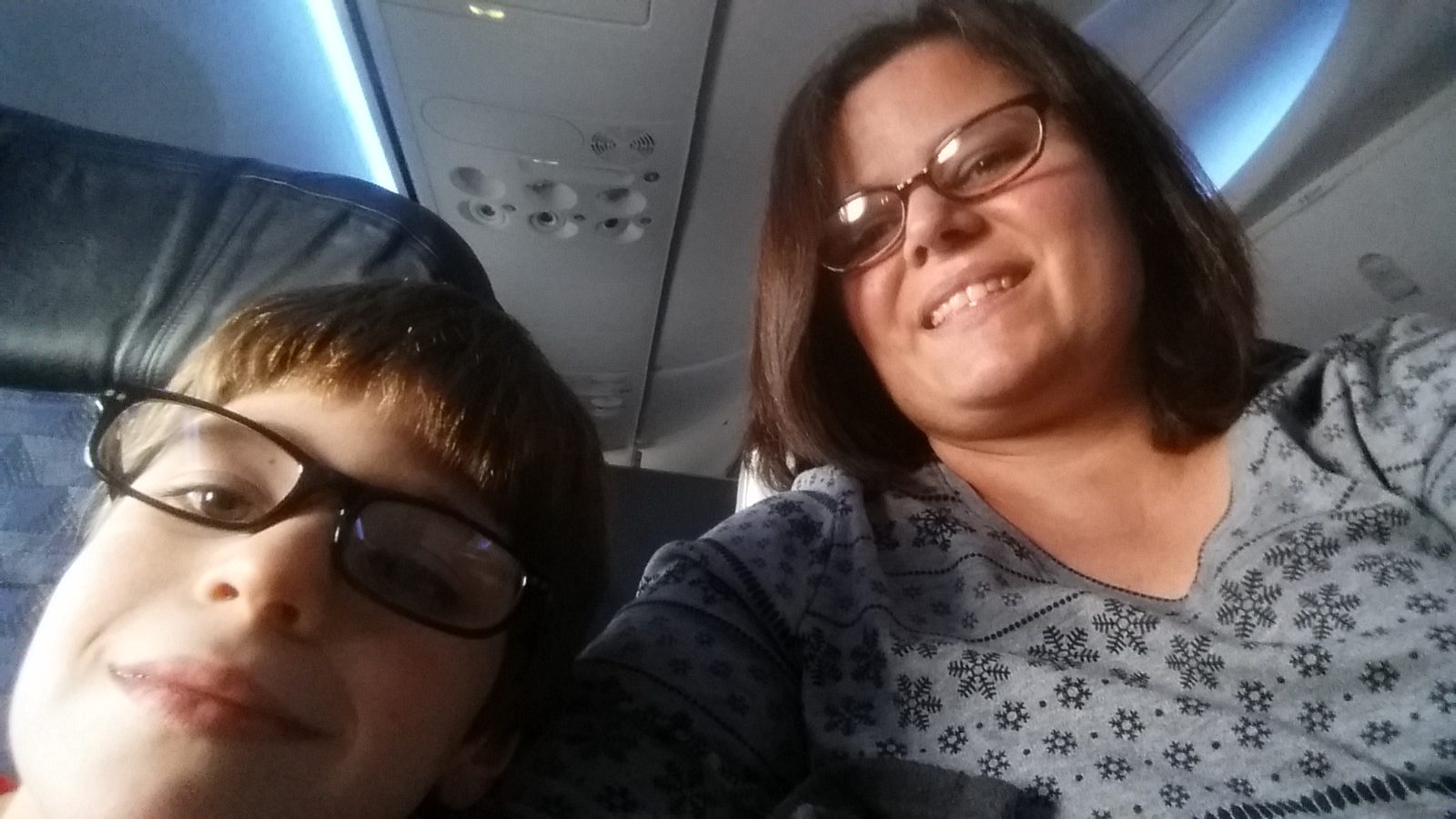Thomas and Kathy on our flight to Orlando