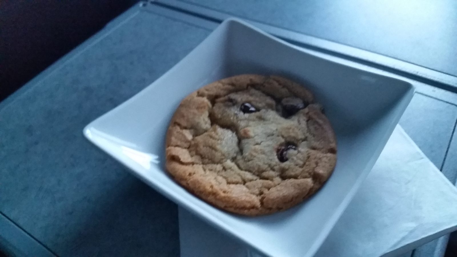A warm cookie for dessert on the flight