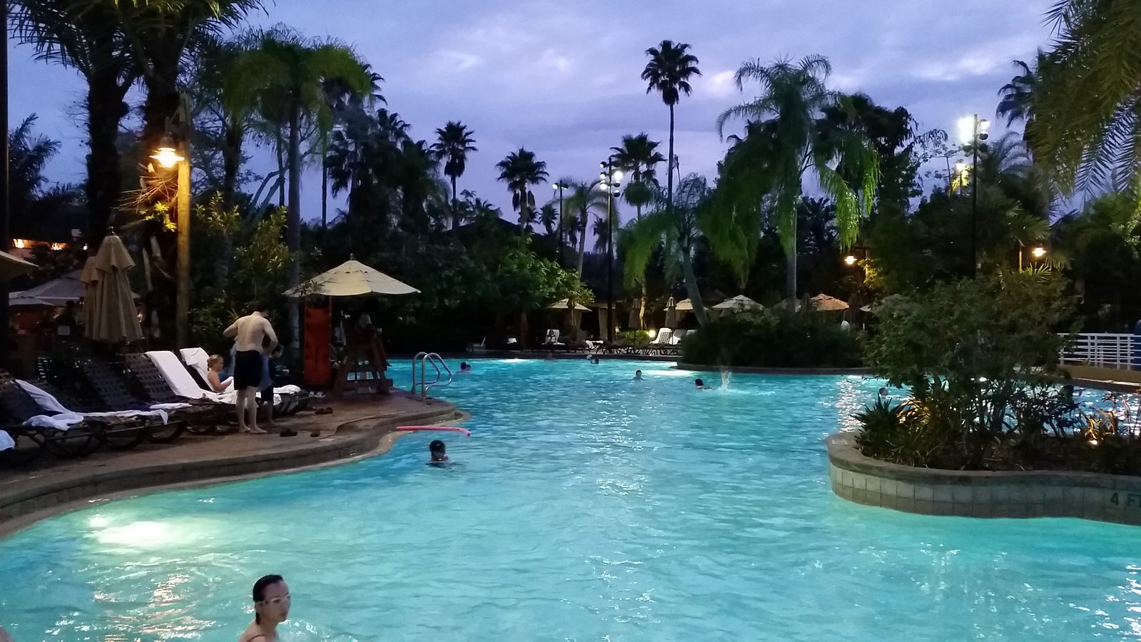 The pool at dusk, one more night at the resort