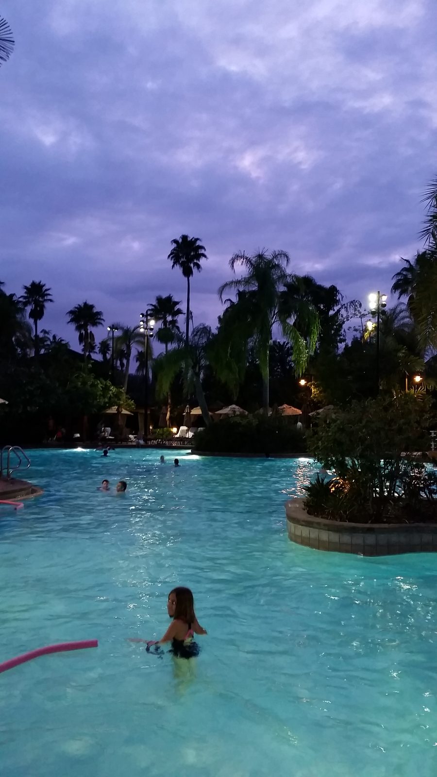 The resort pool at dusk