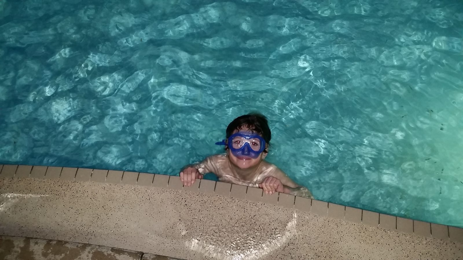 Thomas in his swim mask at the pool