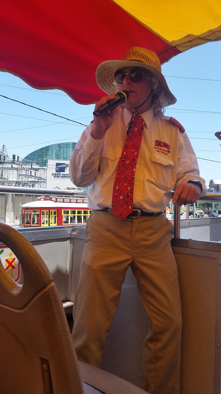 Our City Sightseeing tour guide, mic in hand