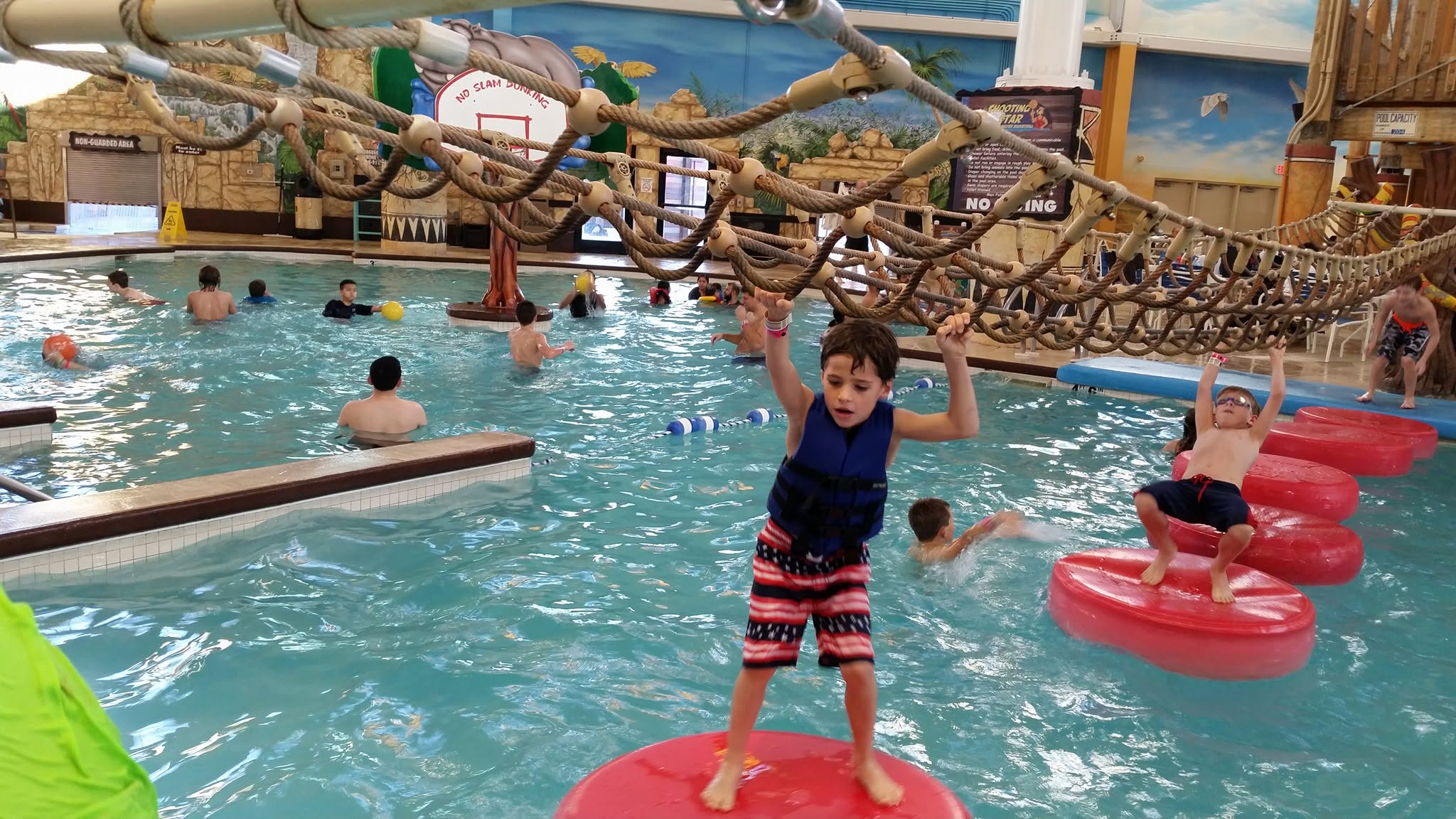 Thomas crossing the lily pads at Kalahari
