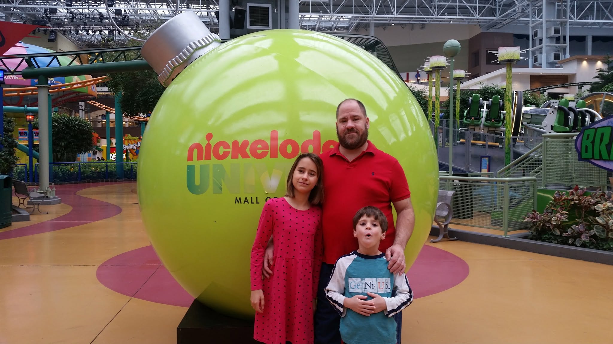 Lisa, Thomas and Michael by the green Nickelodeon ornament