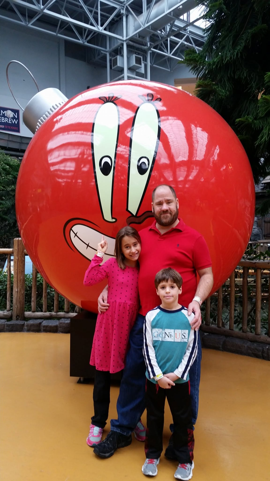 Lisa, Thomas and Michael with the Mr. Krabs ornament