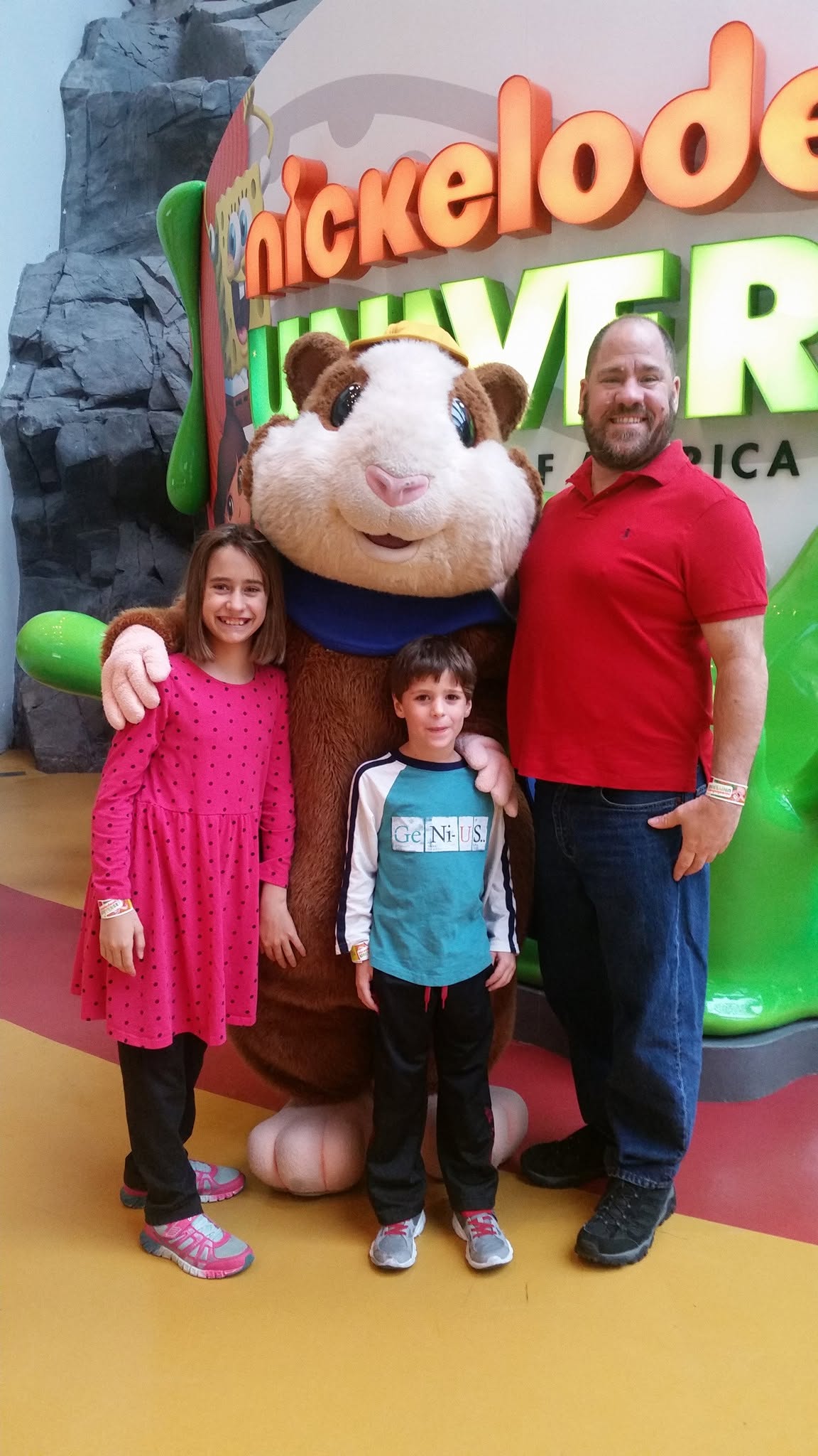 Lisa, Thomas and Michael with a character at Nickelodeon Universe