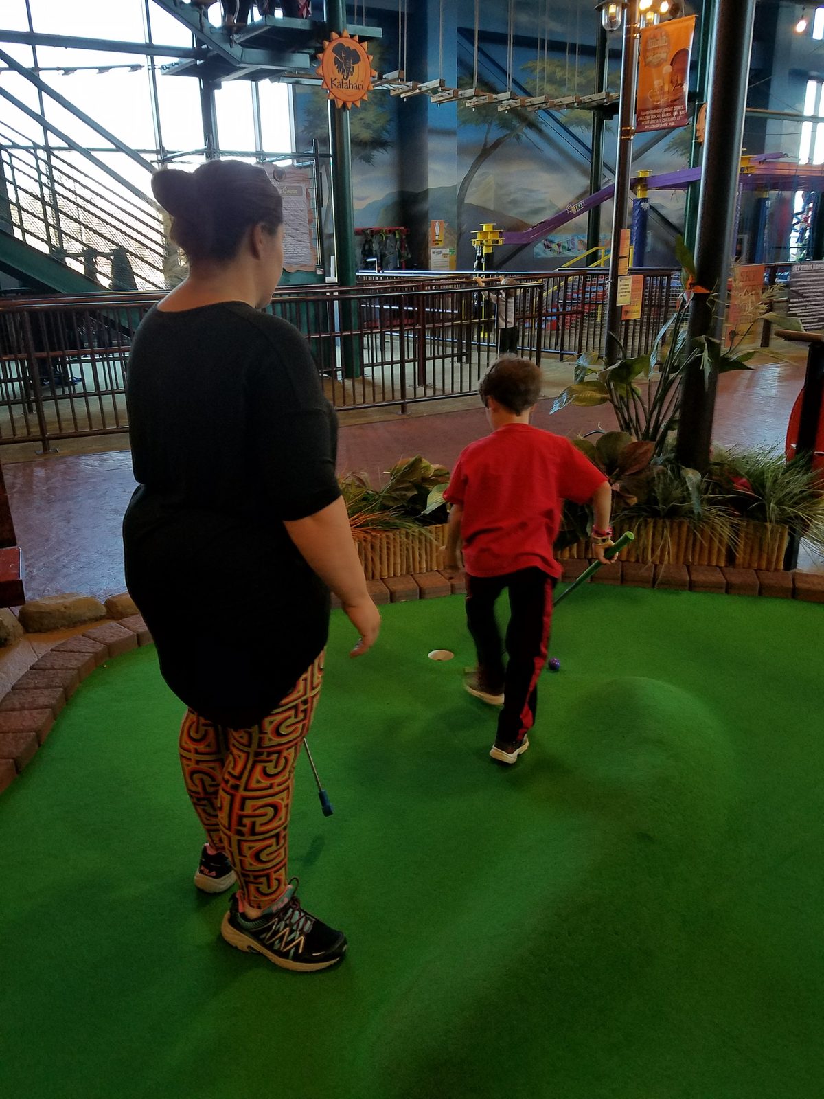 Kathy and Thomas on the mini golf green