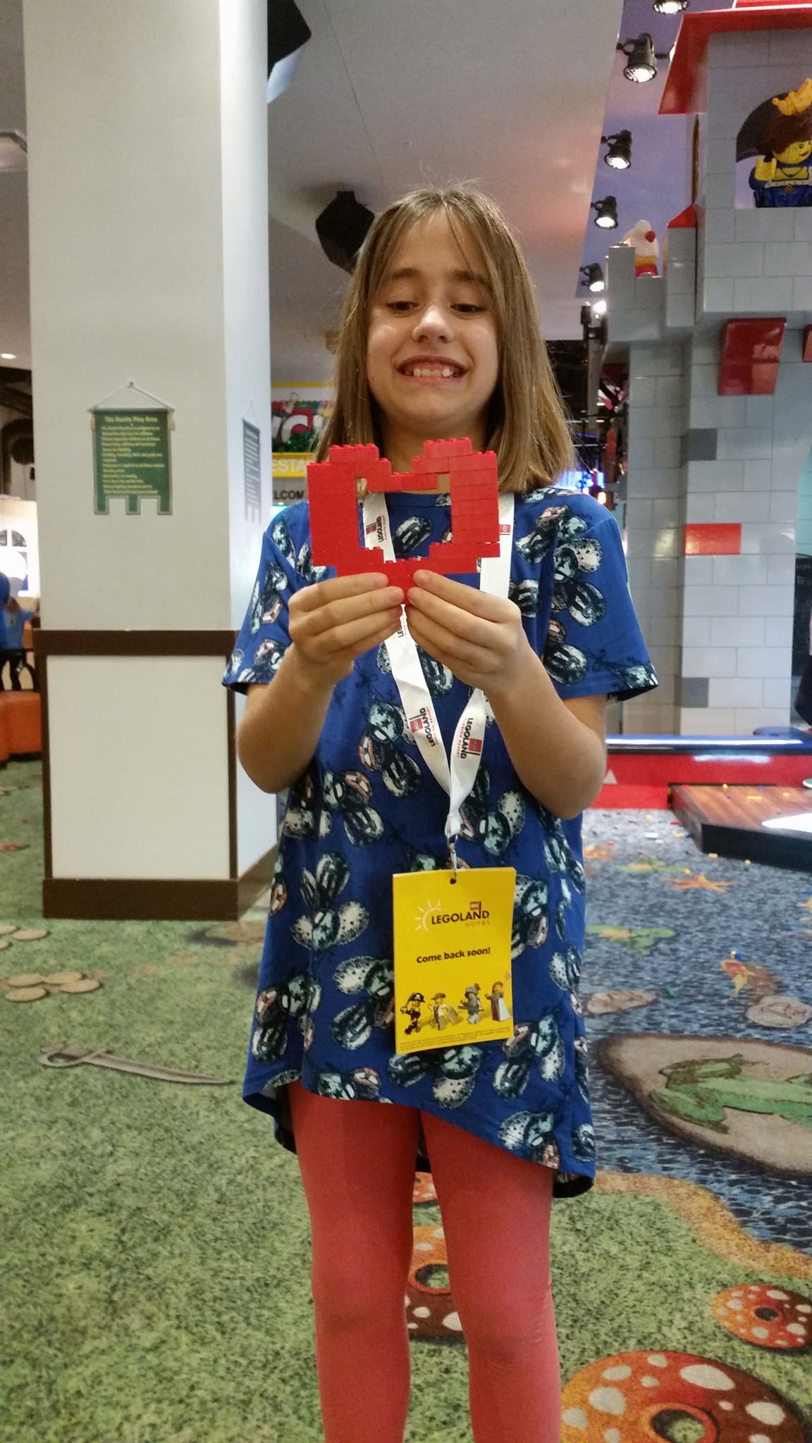 Lisa with her red LEGO heart at the Legoland Hotel