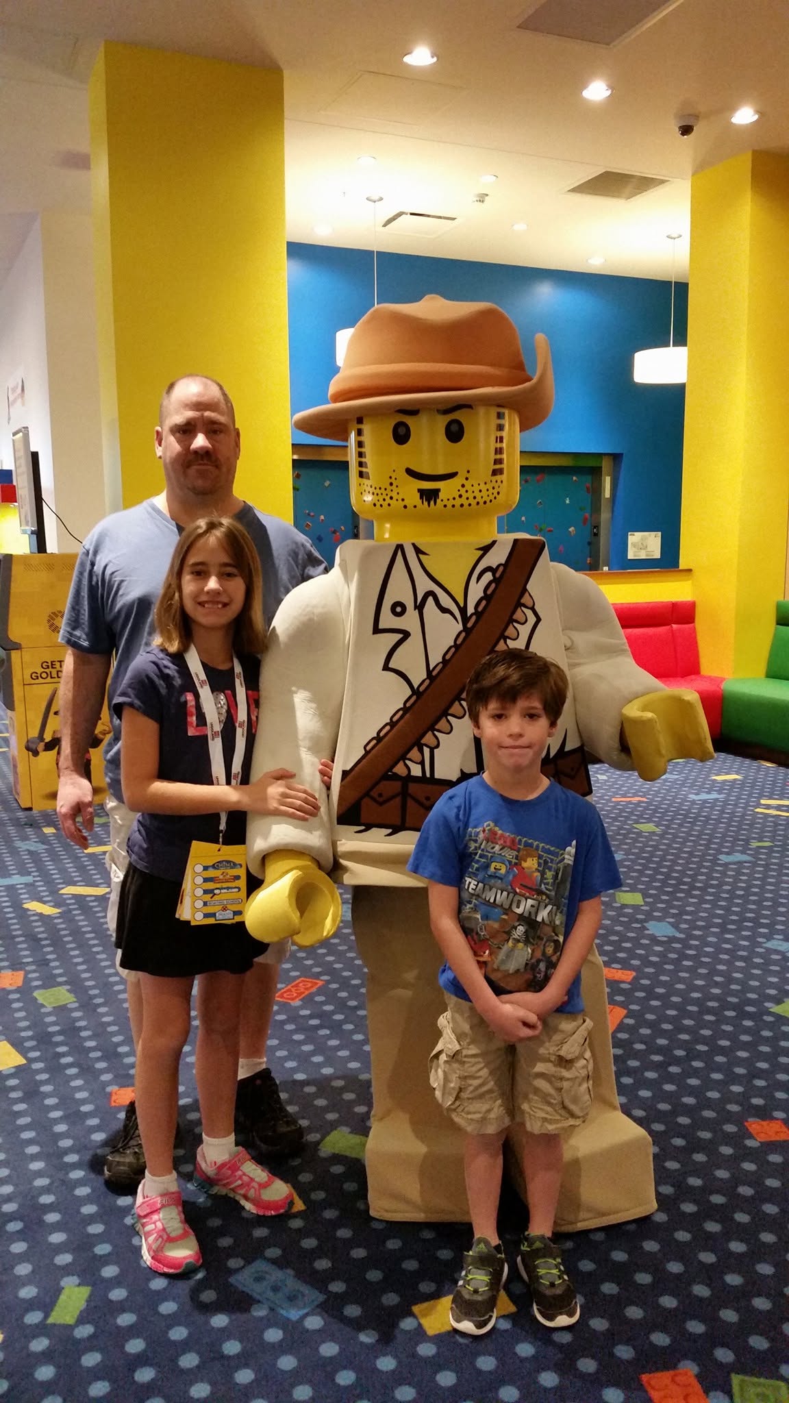 Lisa, Thomas and Michael with a LEGO explorer in the hotel lobby