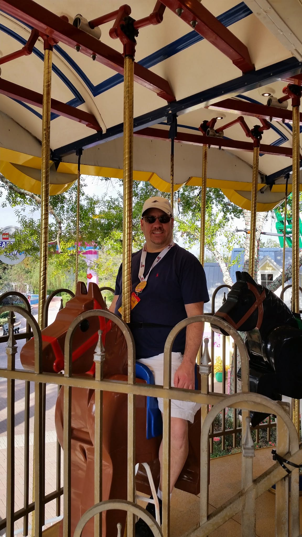 Michael on the carousel at Legoland
