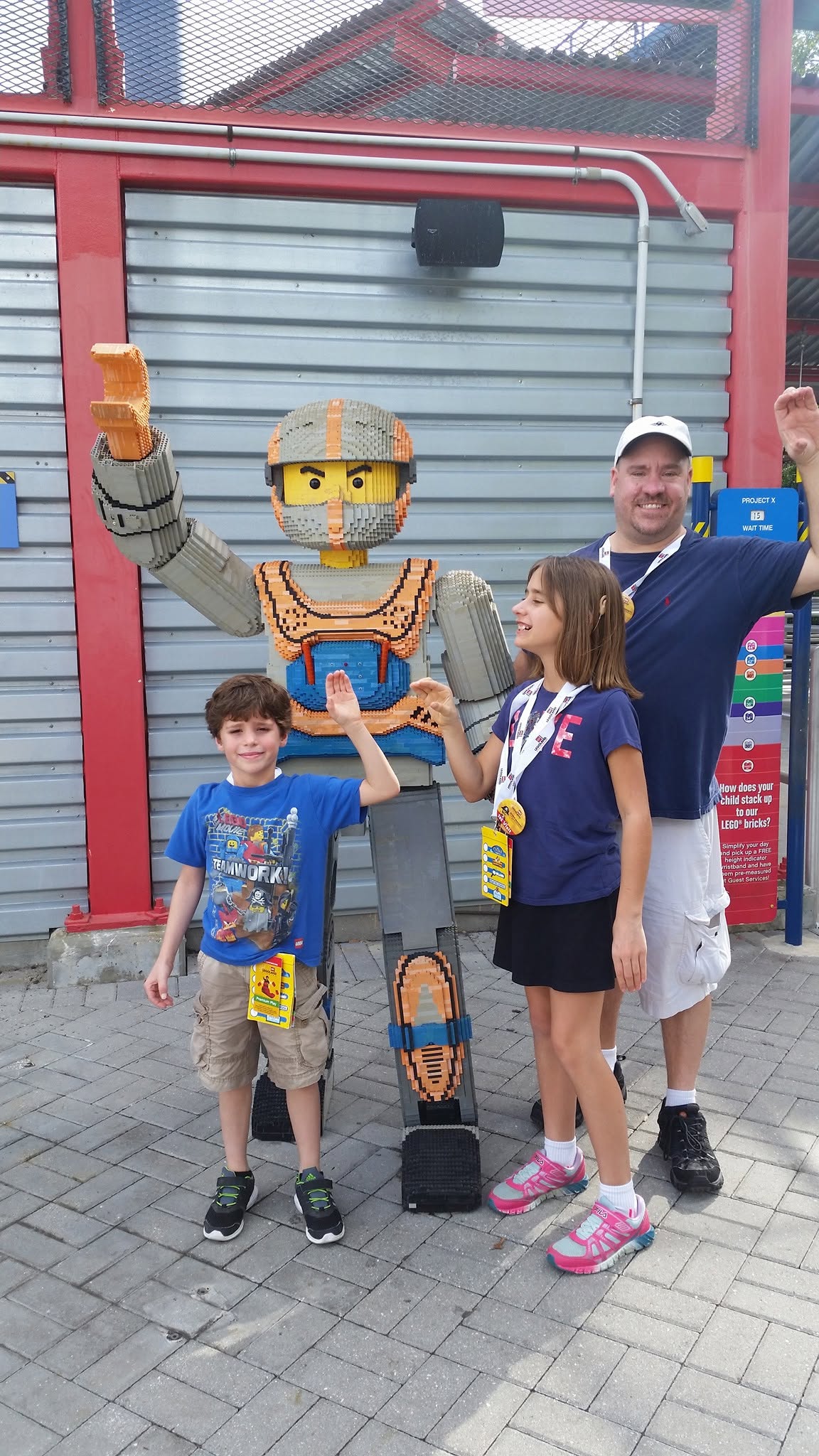 Thomas, Lisa and Michael with a LEGO knight at Legoland
