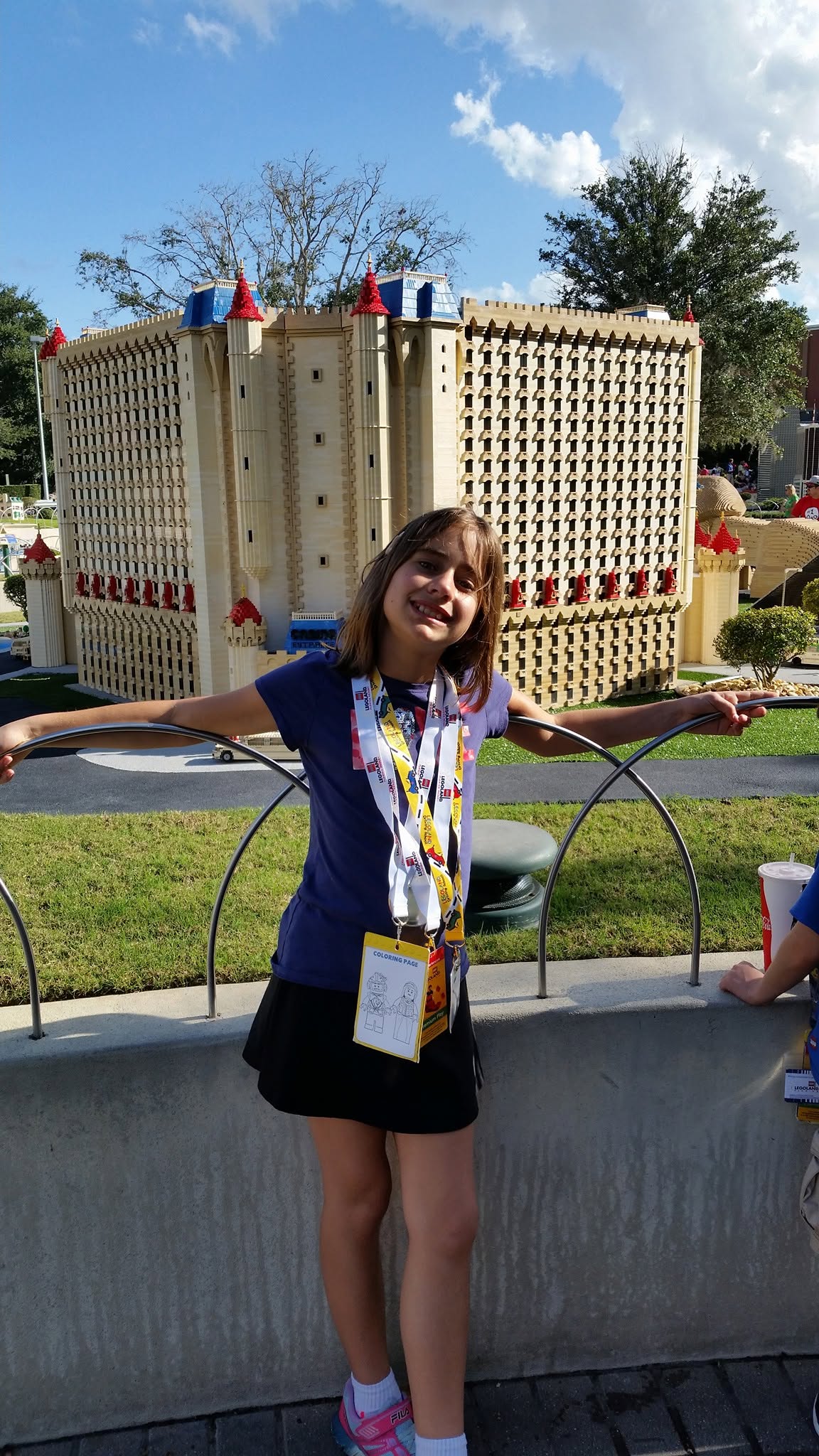 Lisa in front of a LEGO building in Miniland