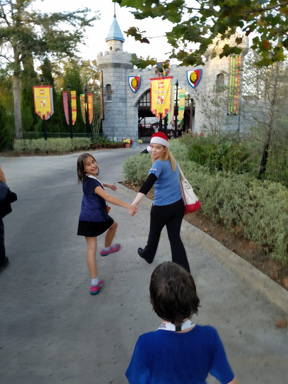 Lisa hand in hand with our guide at Legoland