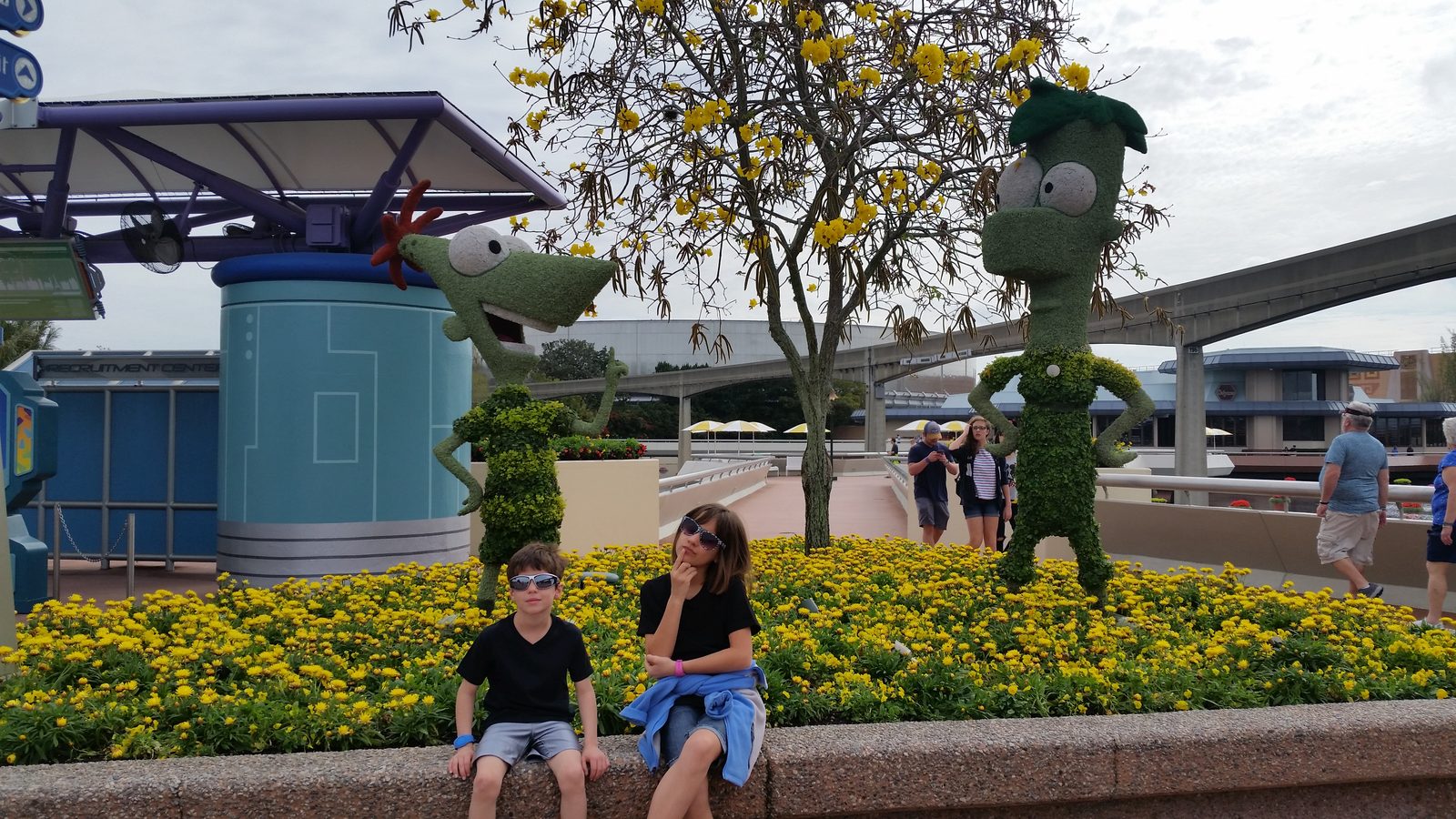 Thomas and Lisa in the topiary garden at Epcot