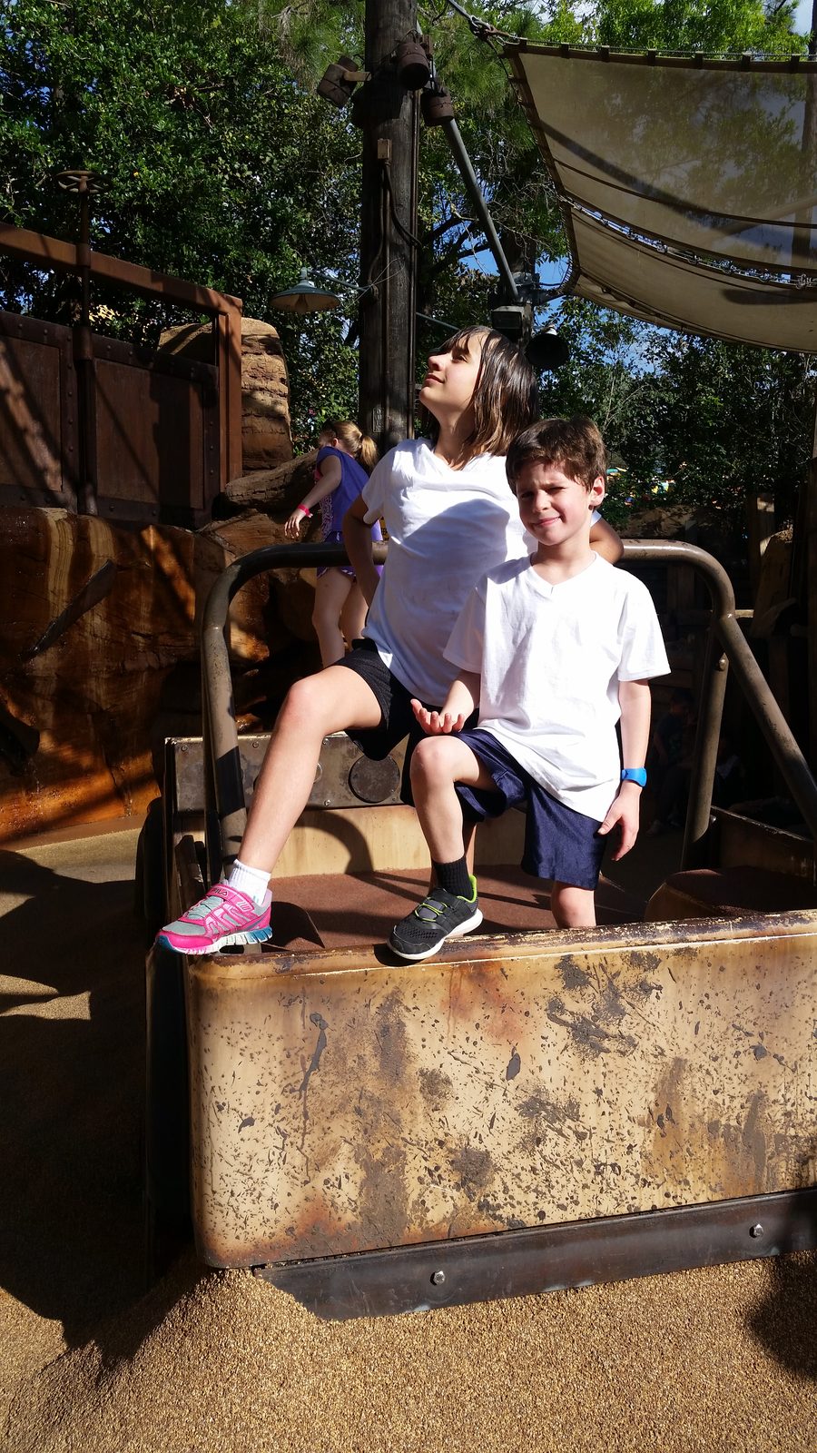 Lisa and Thomas climbing in the Boneyard in DinoLand
