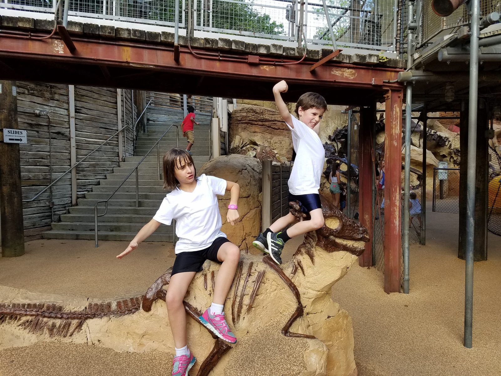 Lisa and Thomas climbing the dino dig site