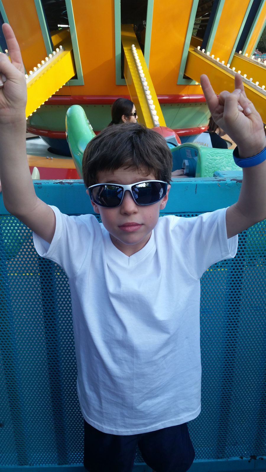Thomas with his arms up on TriceraTop Spin