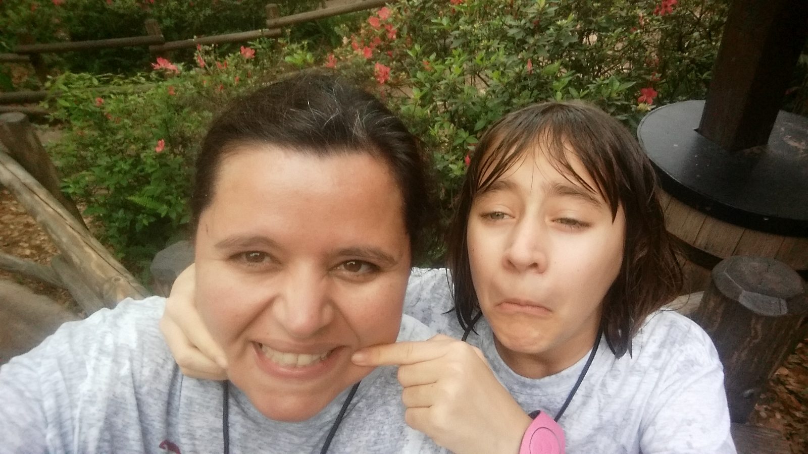 Kathy and Lisa goofing around at the Magic Kingdom