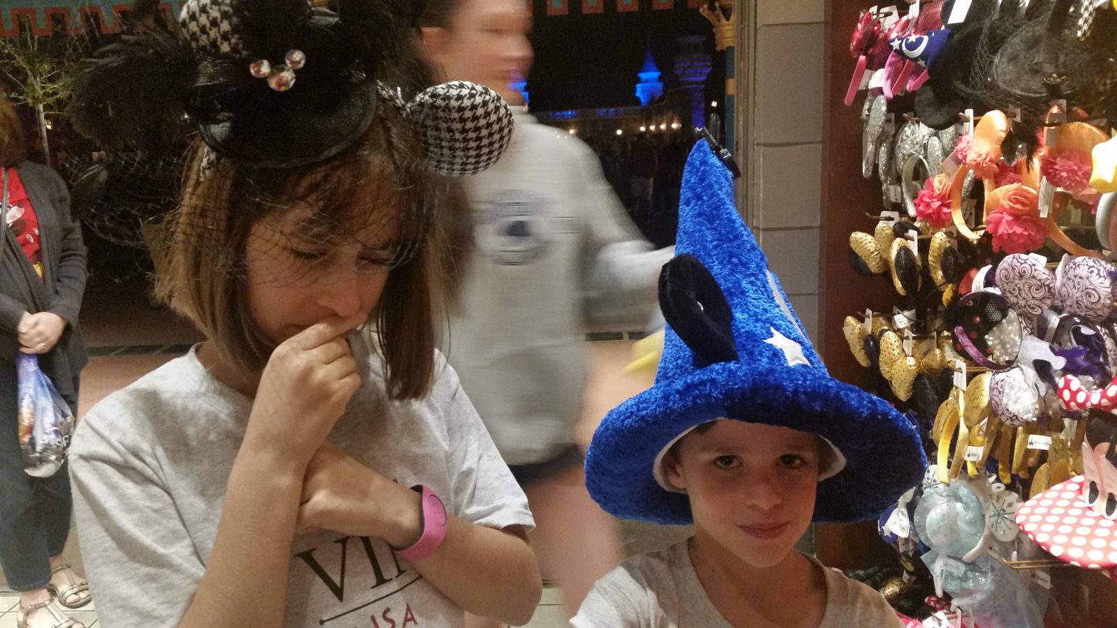 Lisa and Thomas trying on ears and hats before bed
