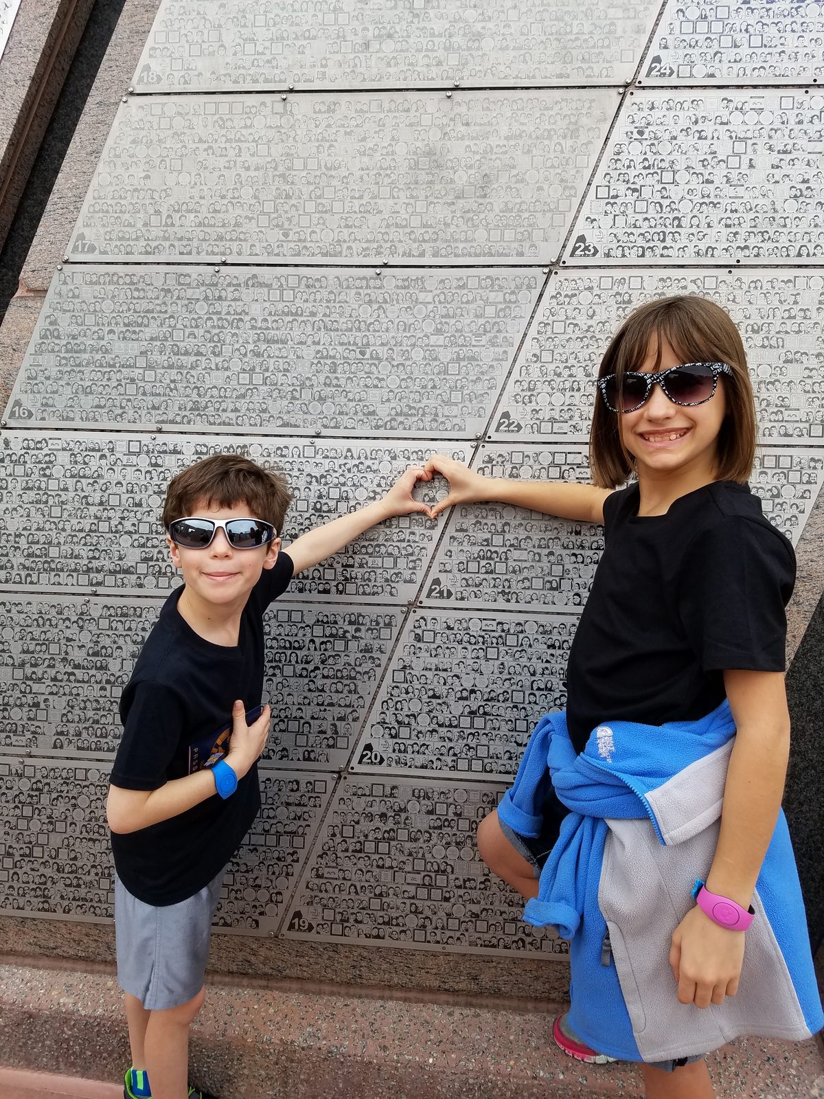 Thomas and Lisa make a heart over our tile