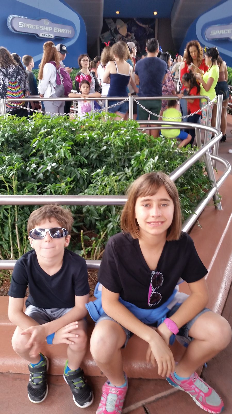 Thomas and Lisa waiting in line at Epcot