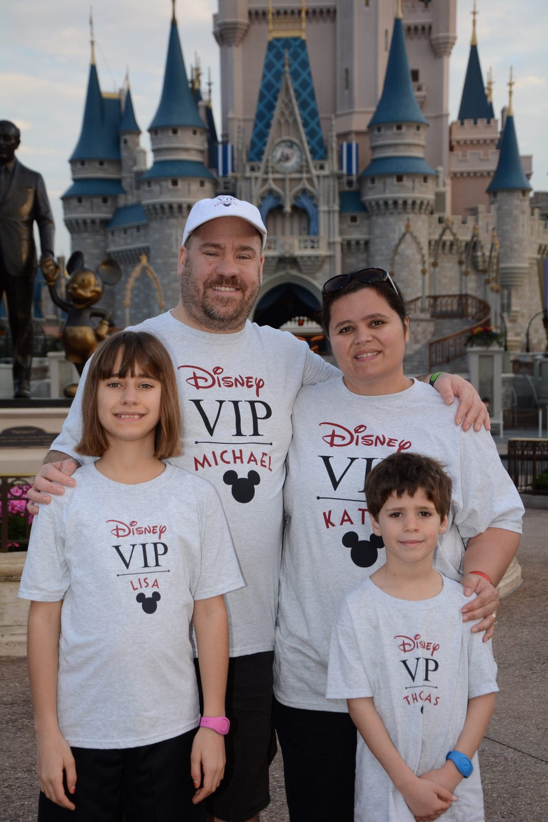The whole family by the castle at sunrise