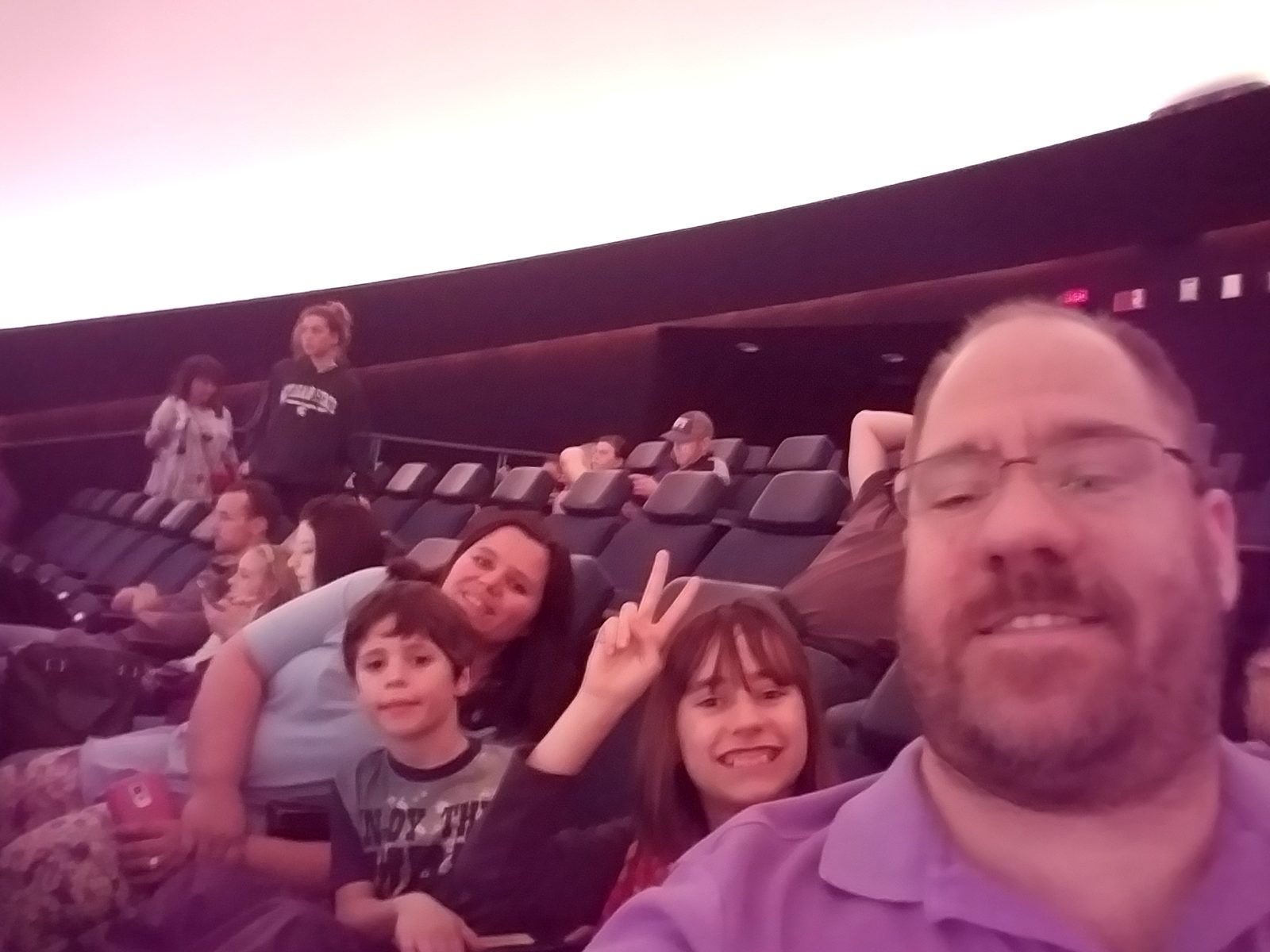 Kathy, Lisa, Thomas and me in the dark planetarium theater