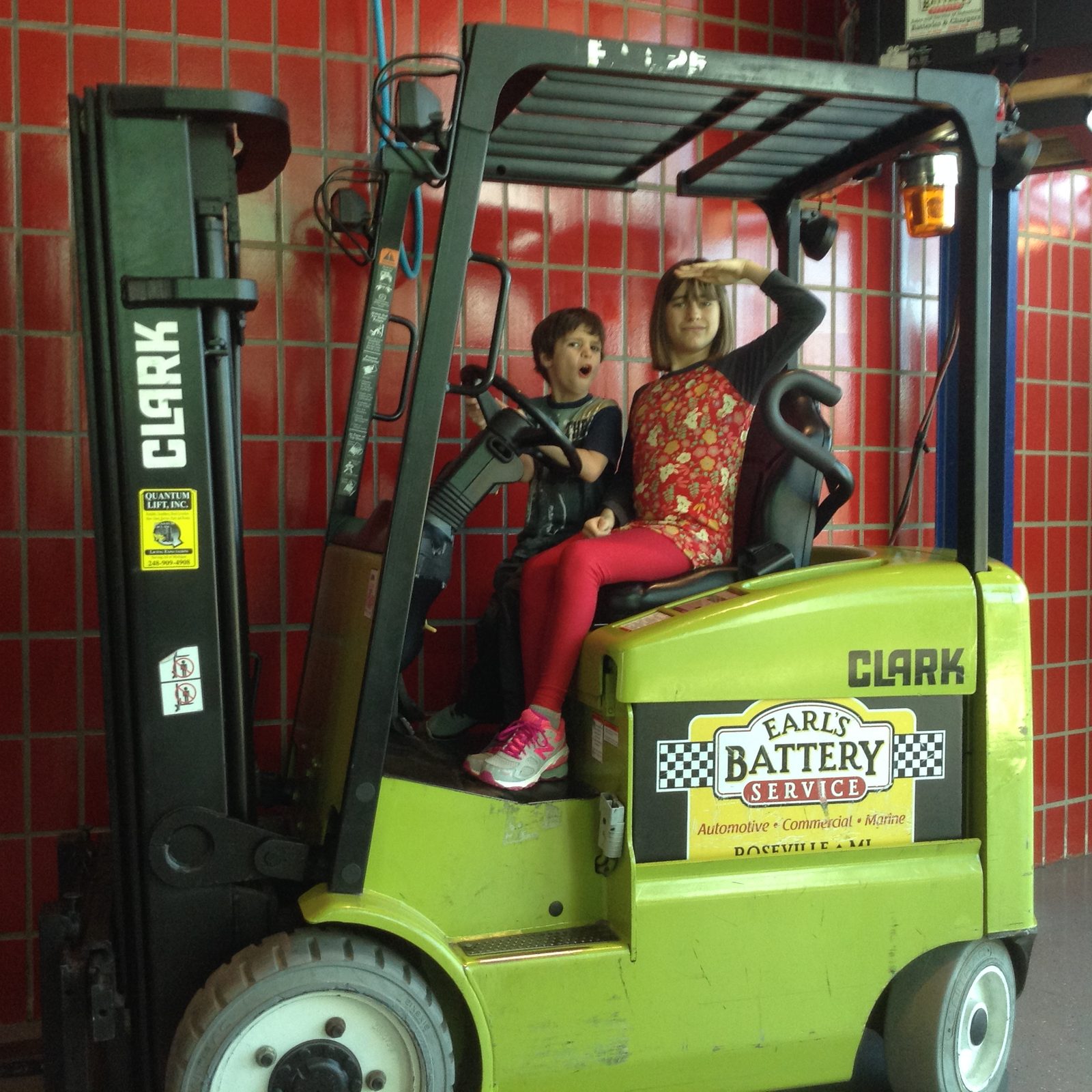 Thomas and Lisa on the toy forklift together