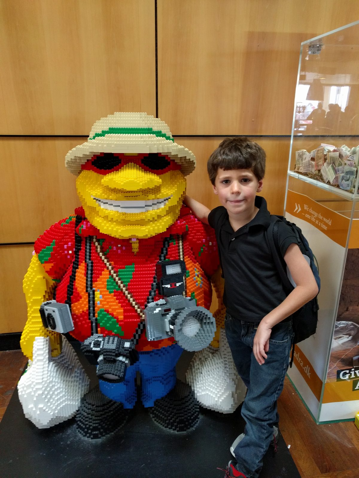 Thomas next to a giant Lego tourist figure