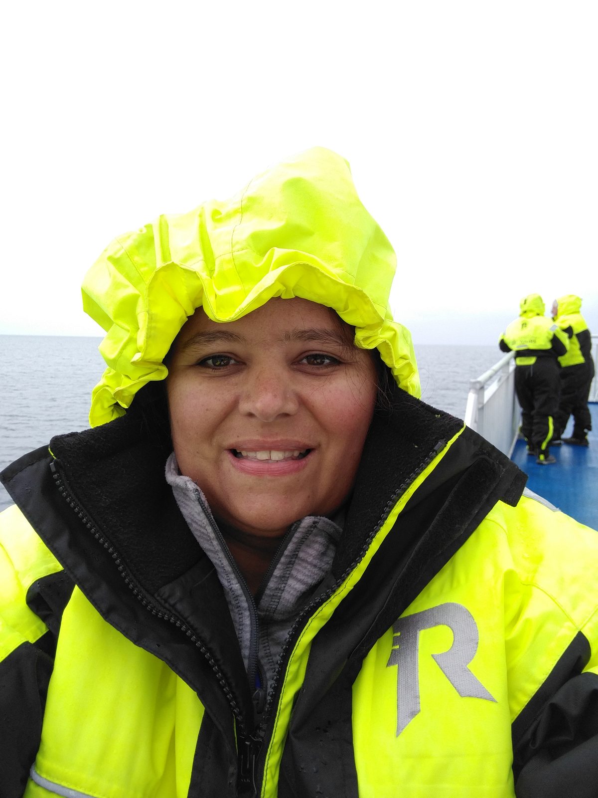 Kathy on deck in her rain gear on the whale boat