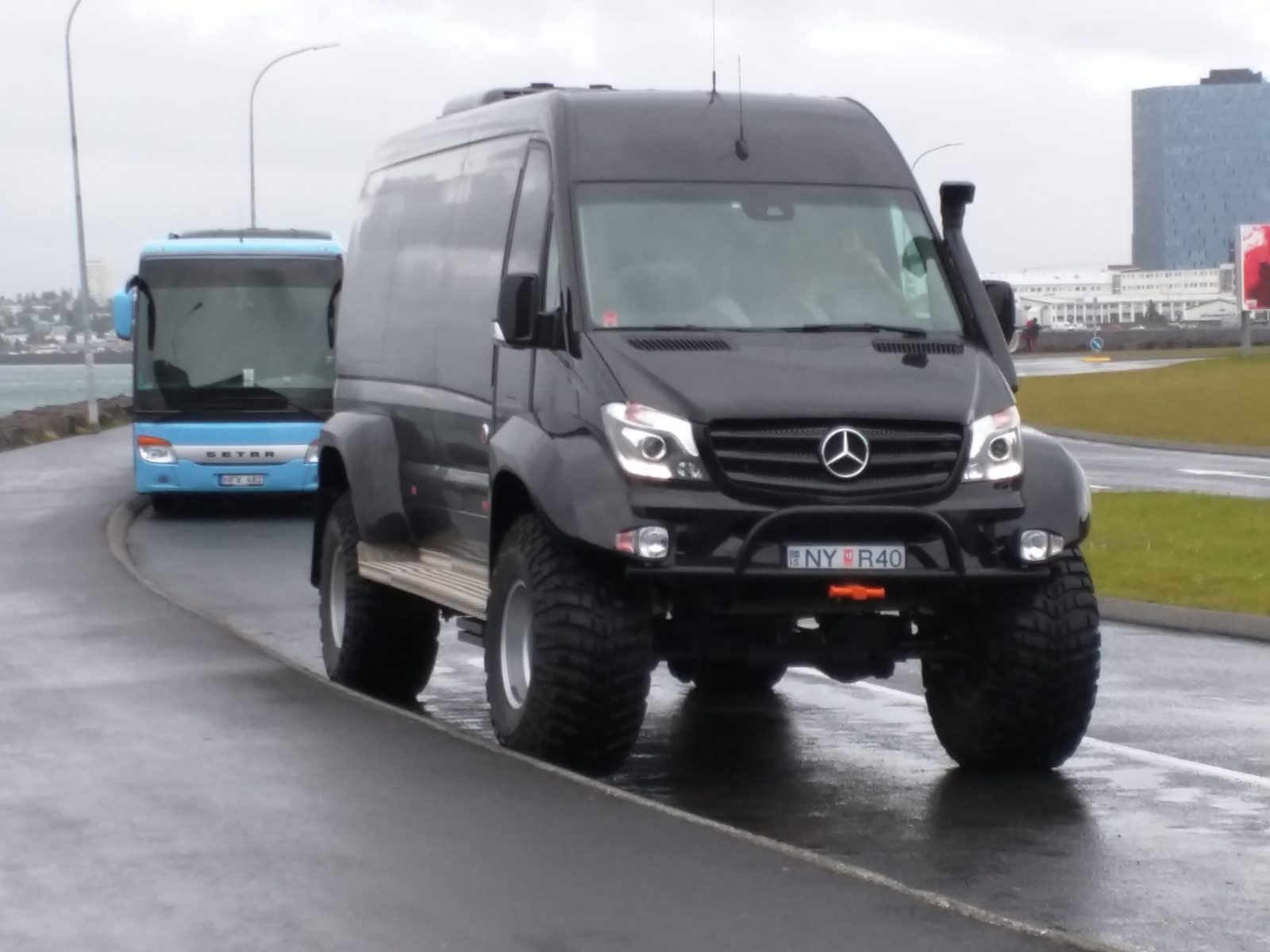 The big black tour truck near the harbor in Reykjavik