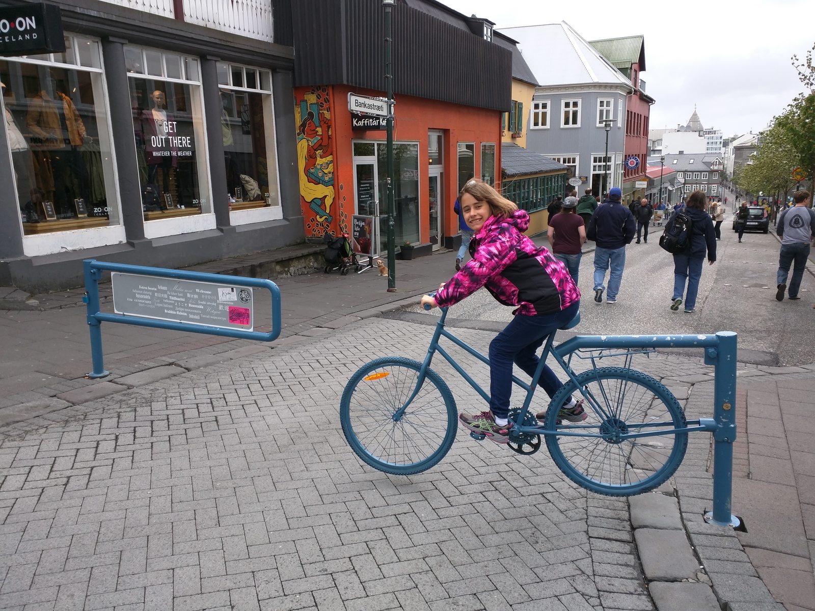 Lisa riding a rented bike downtown