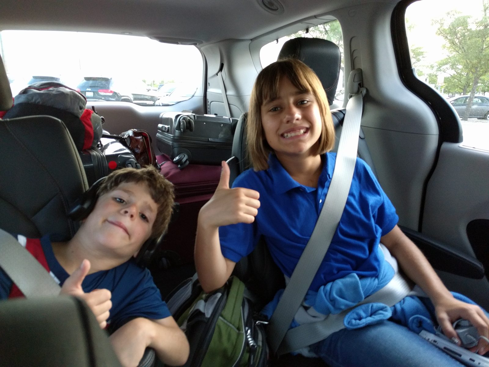 Thomas and Lisa giving thumbs up, almost home