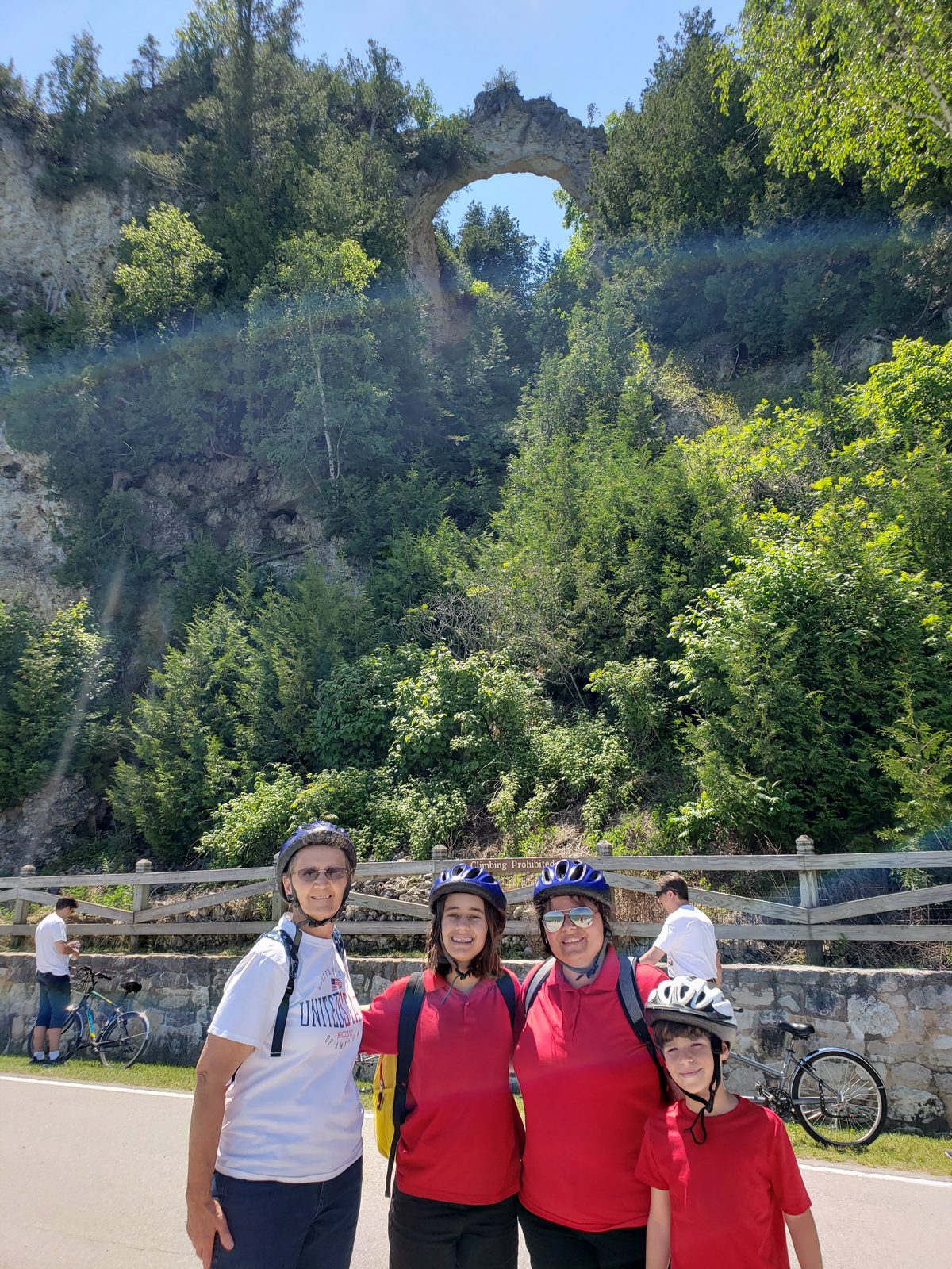 Grandma, Lisa, Kathy and Thomas below Arch Rock