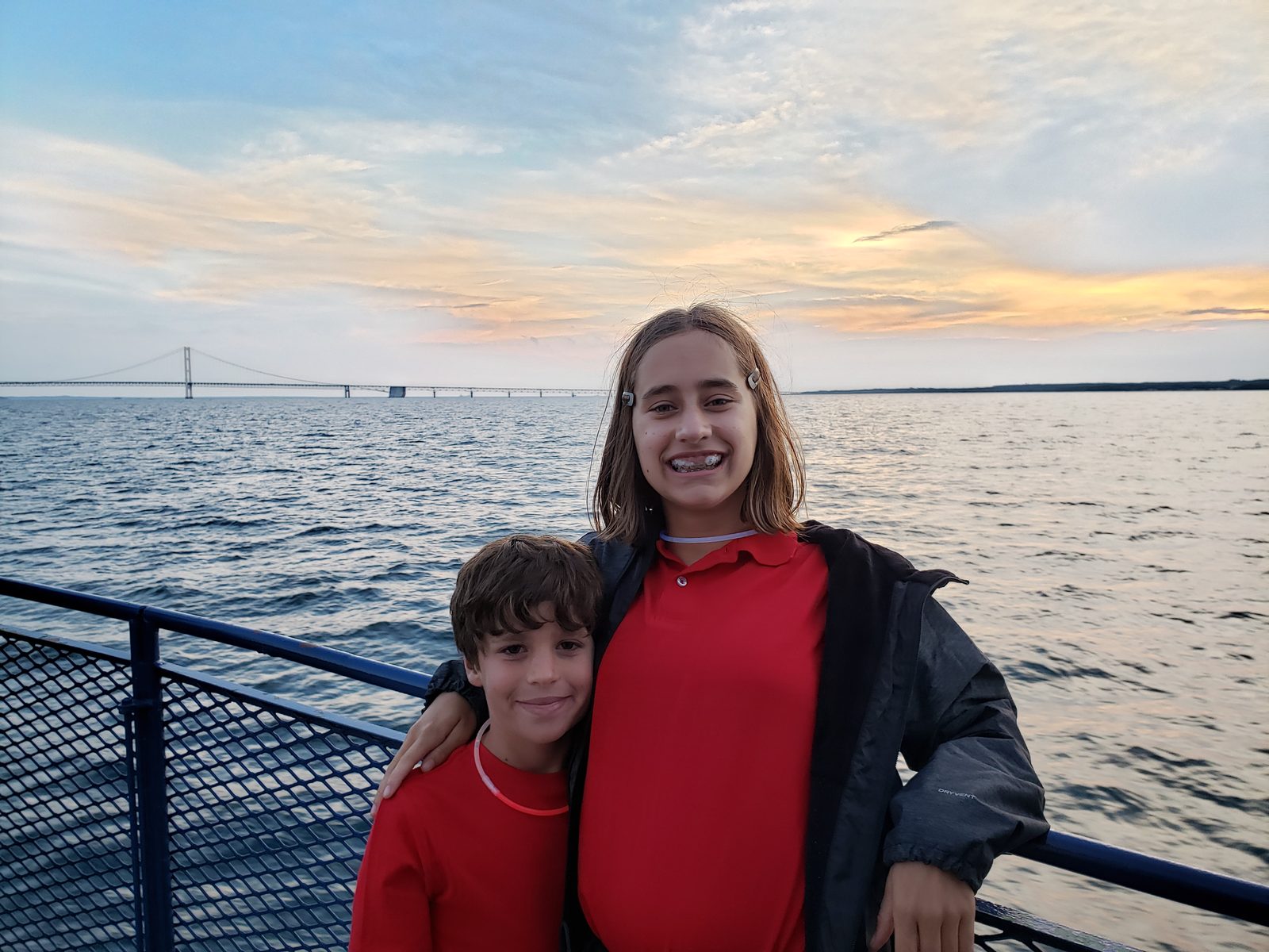 Thomas and Lisa on the sunset cruise, Mackinac Bridge behind