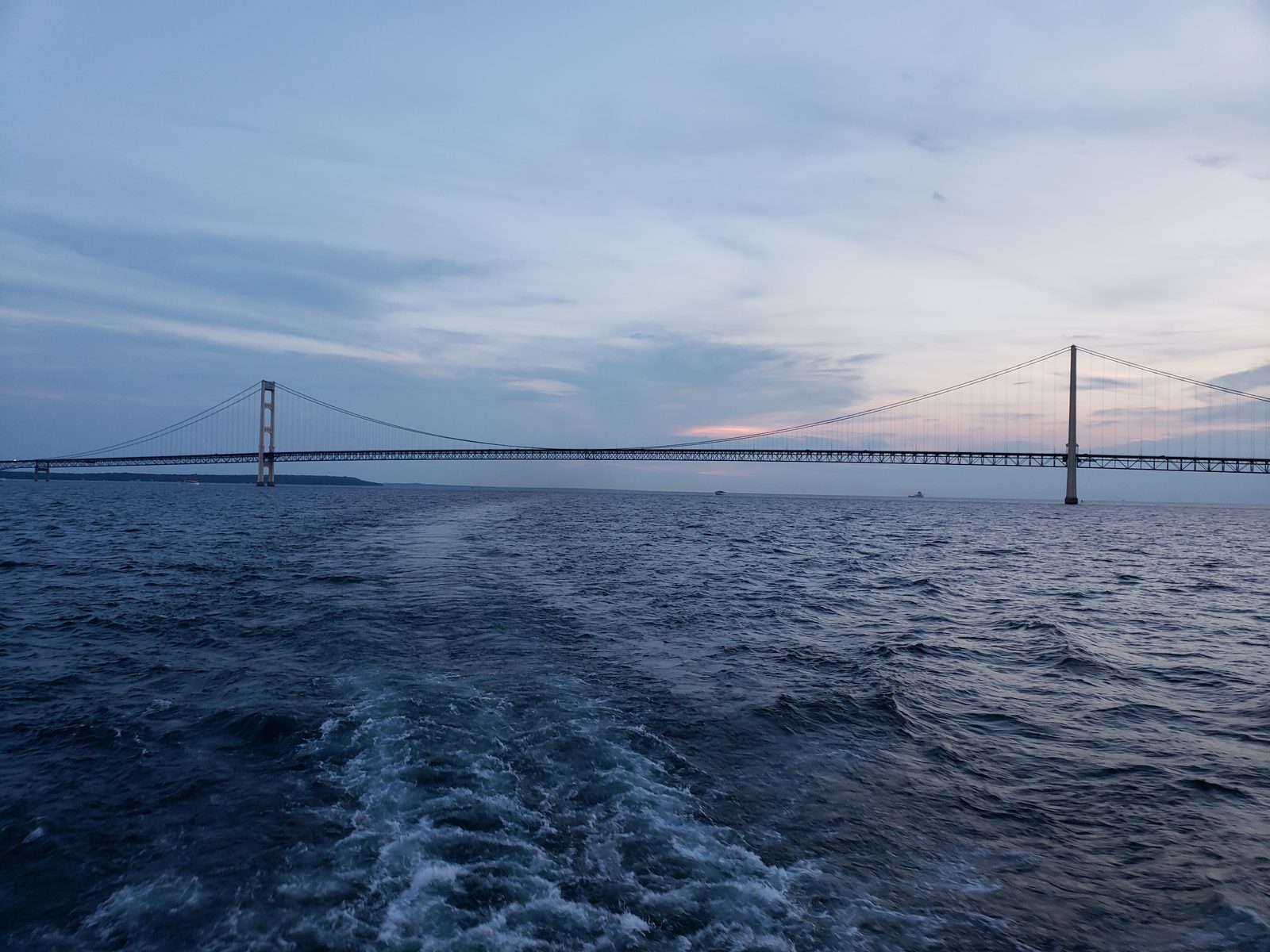 The Mackinac Bridge at sunset from the ferry
