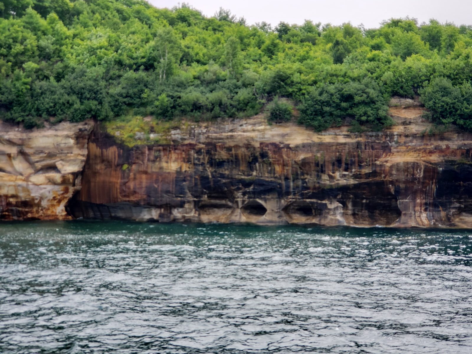 Sea caves in the Pictured Rocks cliffs