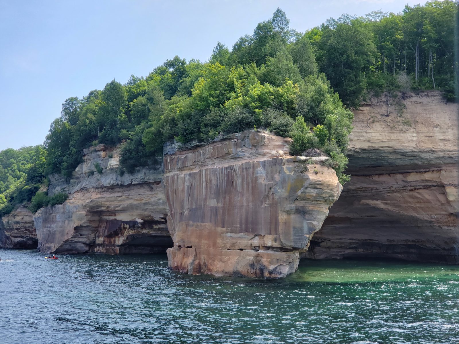 Sandstone point along the cliffs on the boat tour