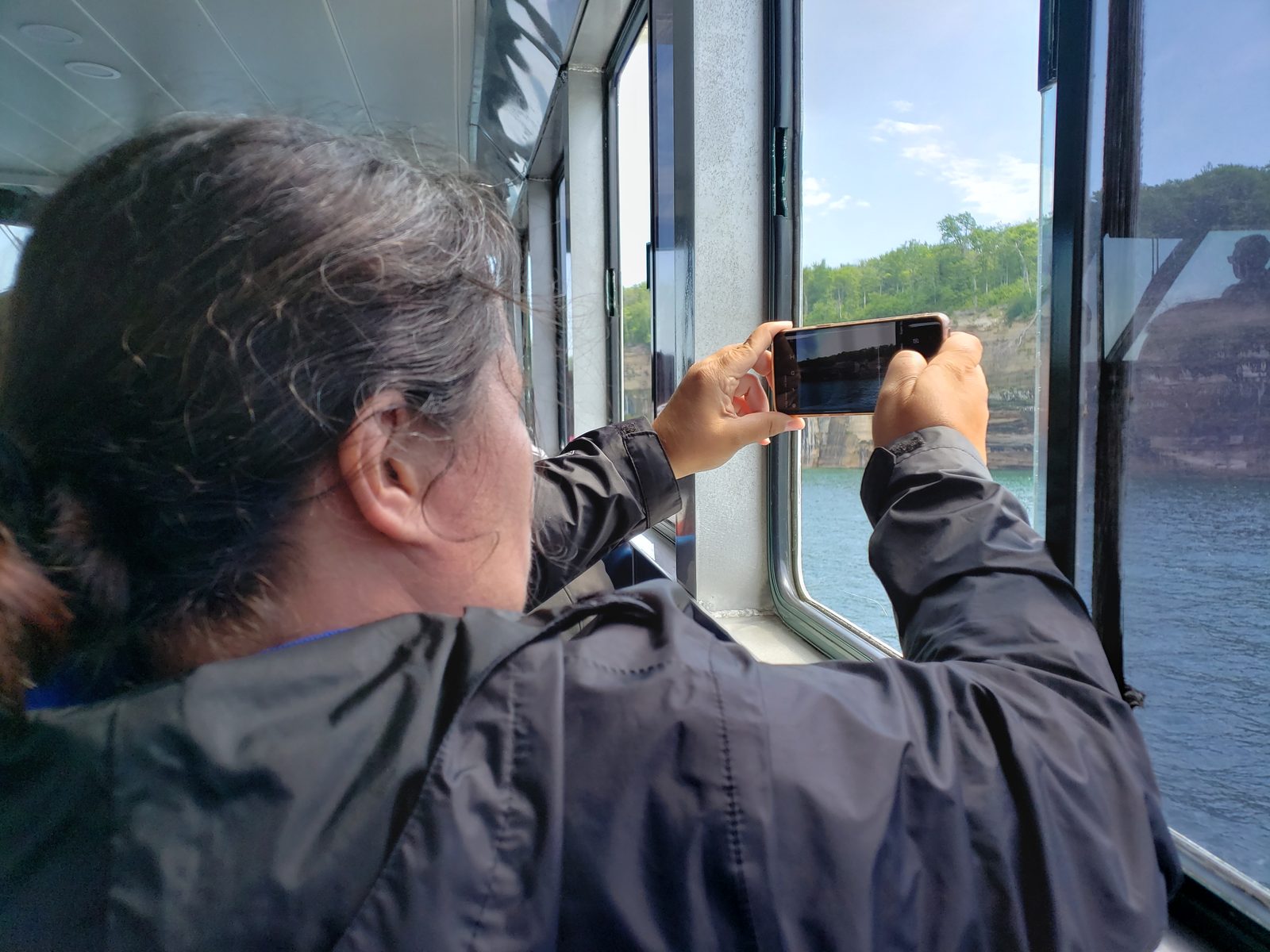 Photographing the cliffs from the boat