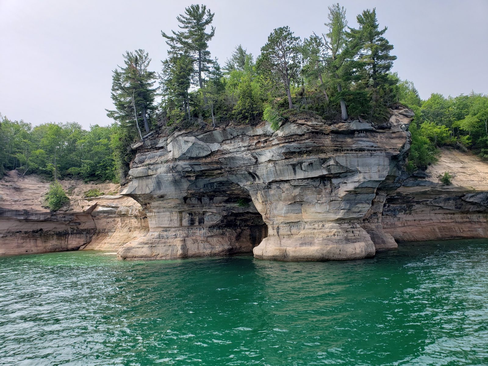 Pine-topped rock arch on the Pictured Rocks boat tour
