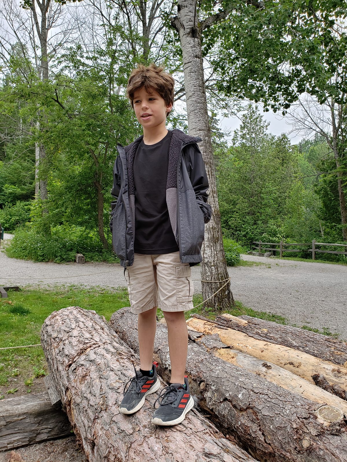Thomas balancing on a log at Mill Creek