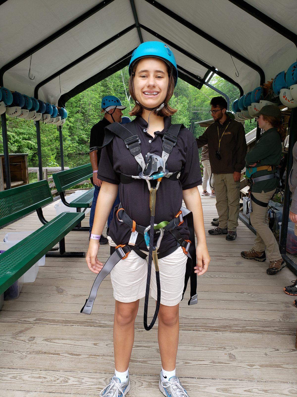 Lisa harnessed up and ready to zipline at Mill Creek