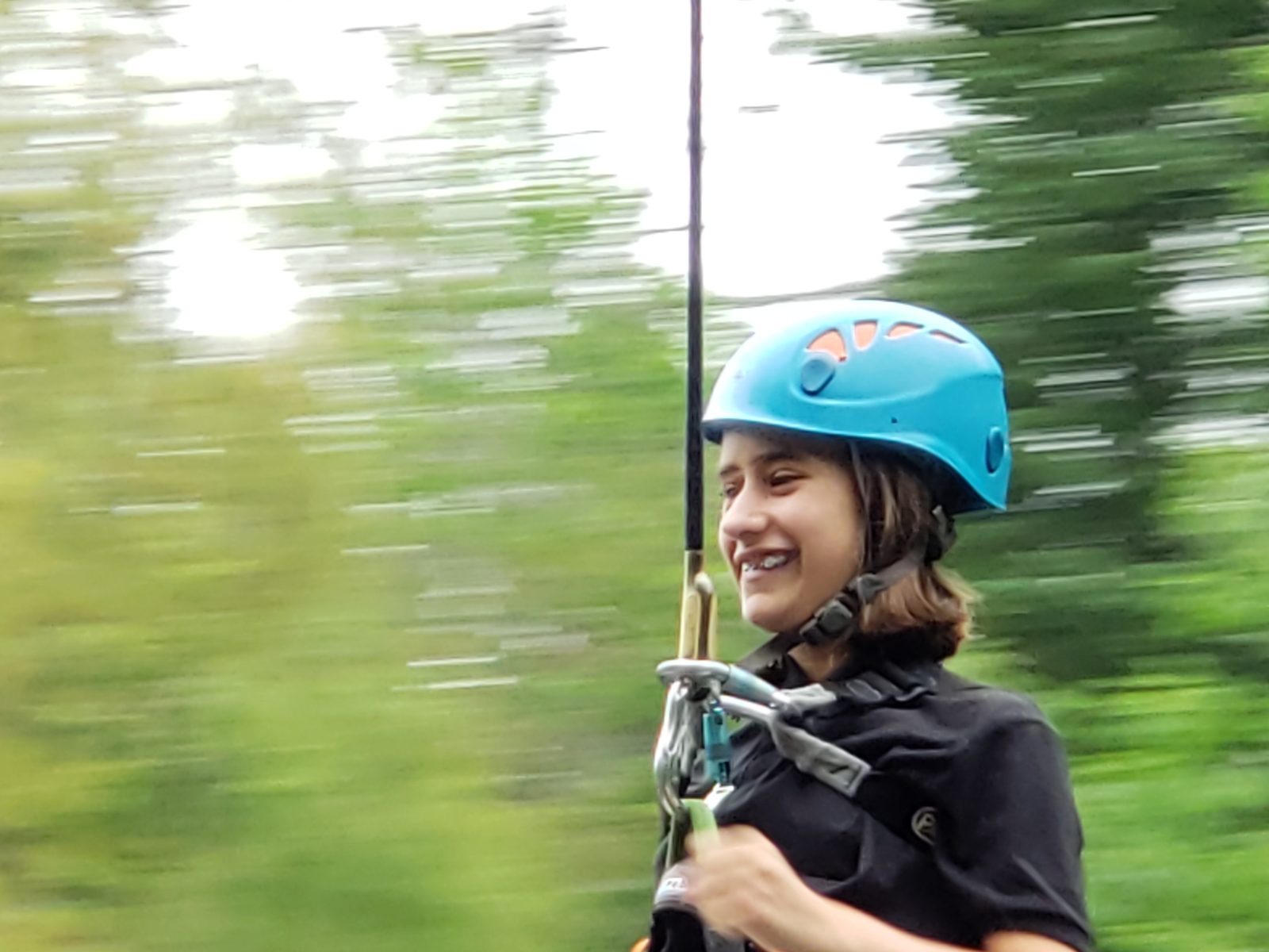 Lisa flying through the treetops