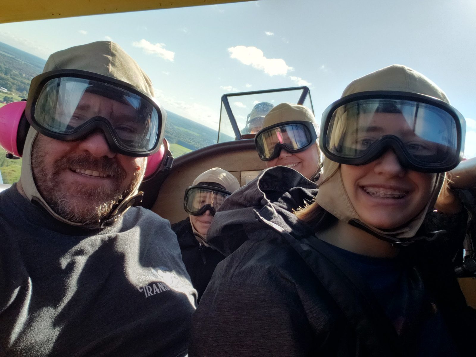 Thomas, Kathy, Lisa and me, goggles on for our second biplane flight