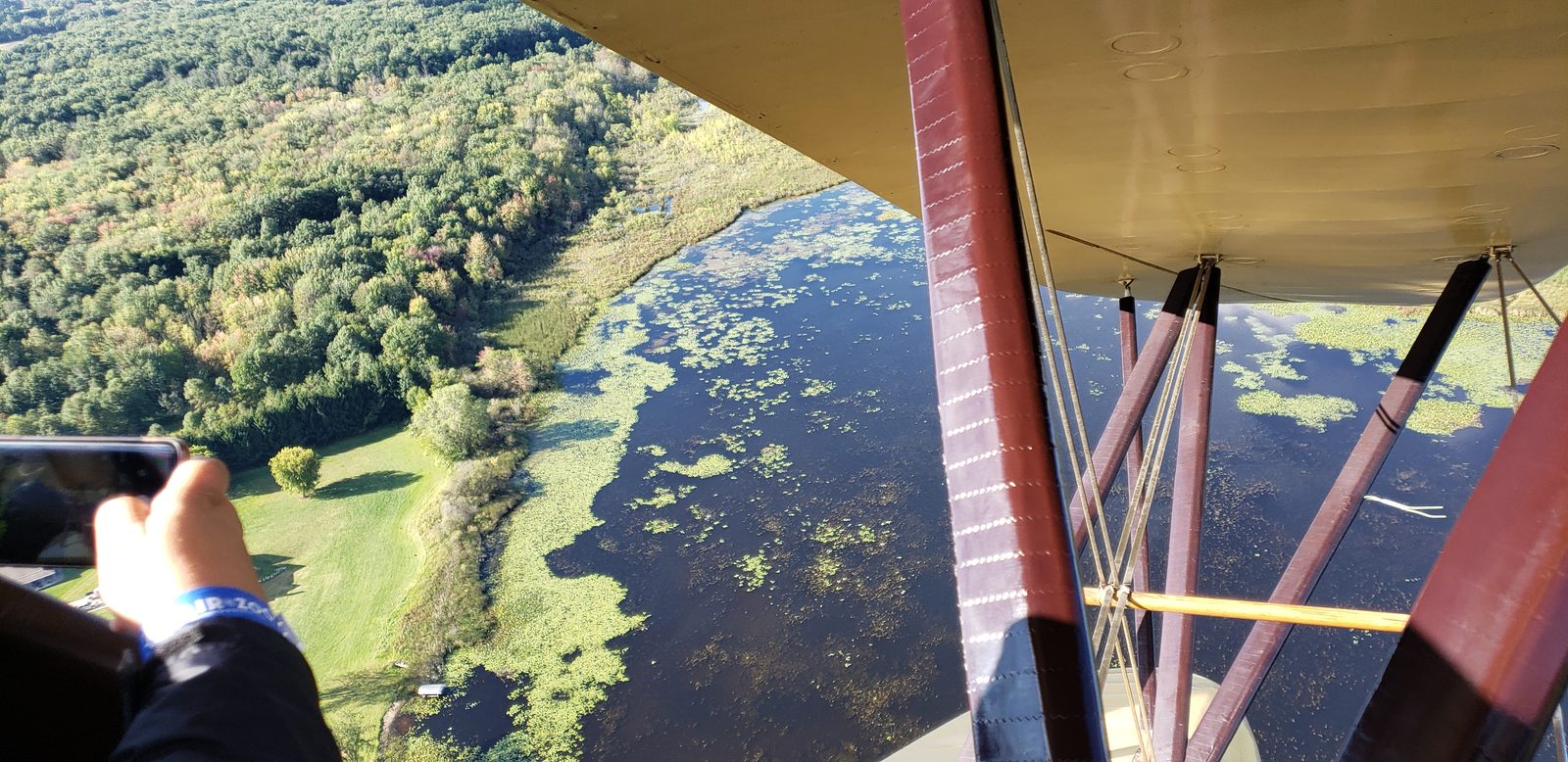 Looking down over the fields from the open cockpit