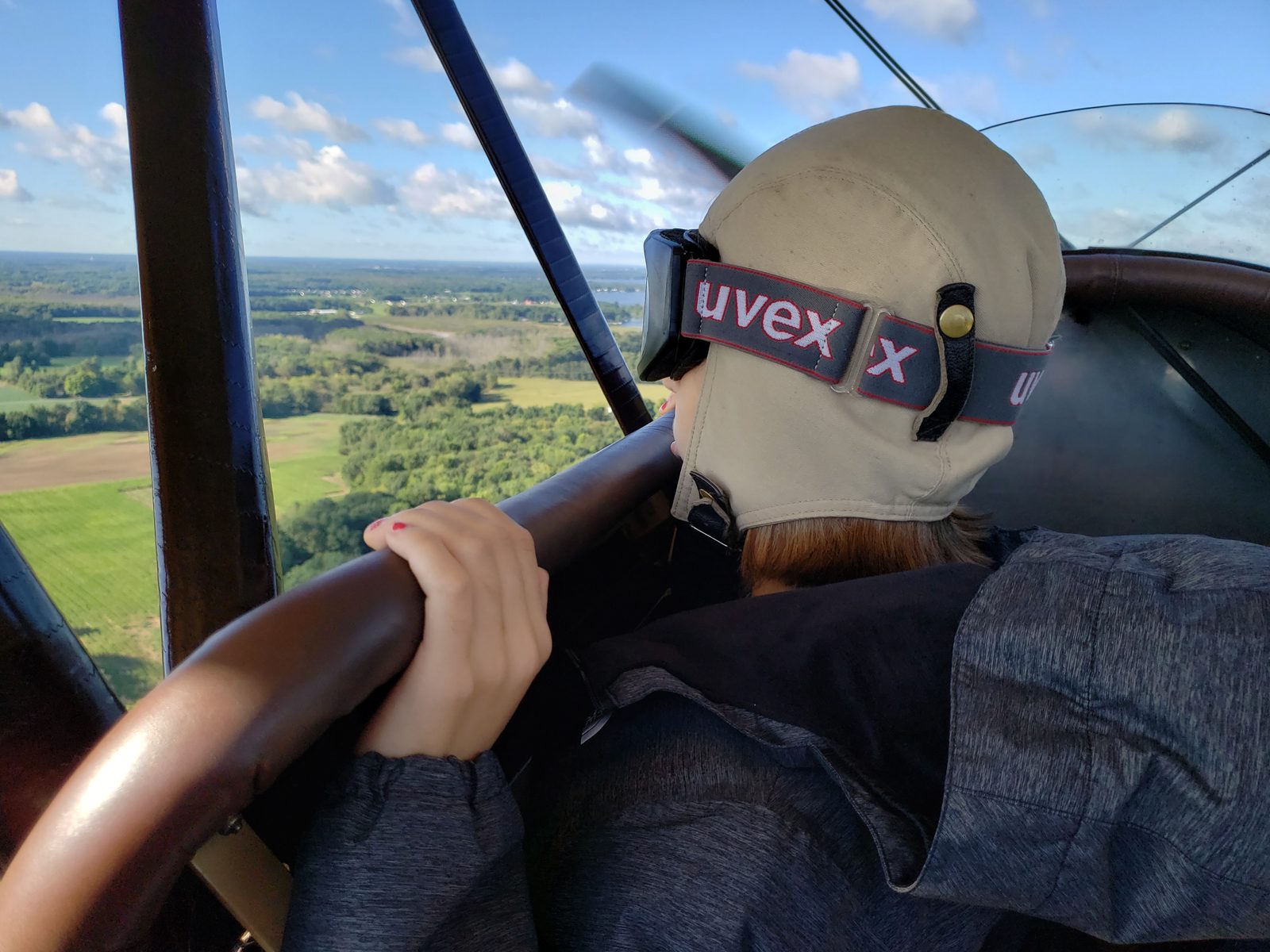 Hanging on in the front cockpit of the biplane