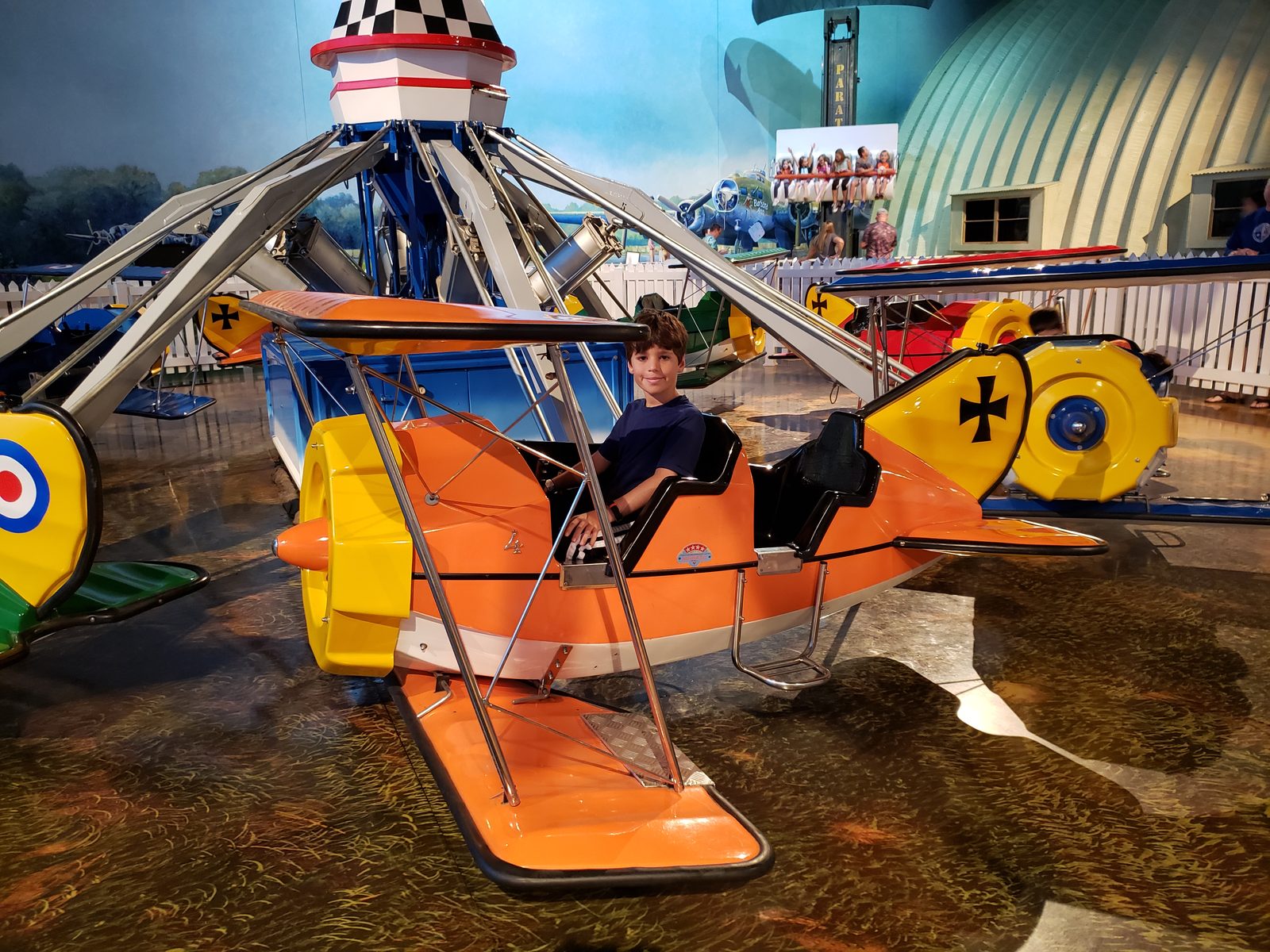 Thomas flying a little plane at the Air Zoo