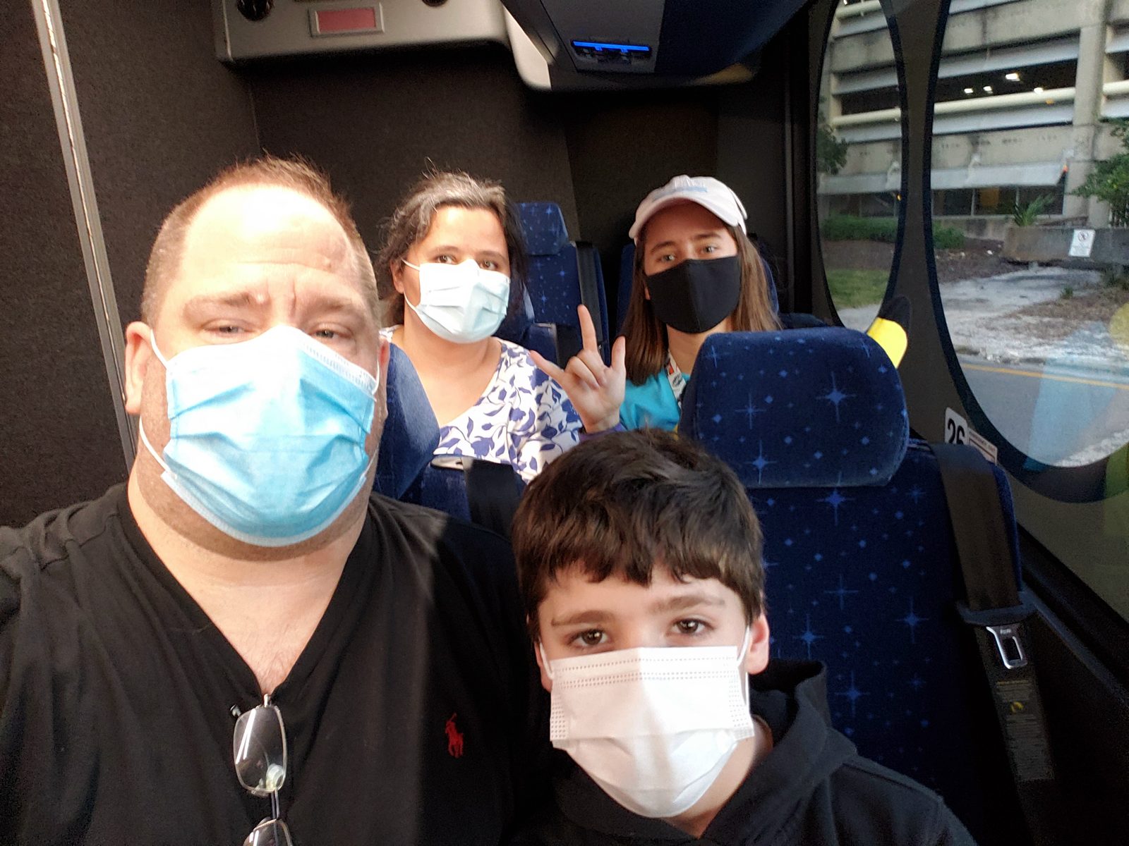 The four of us masked up on the ride to the resort