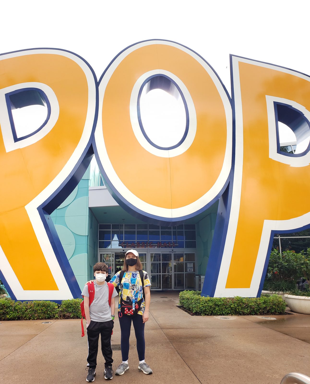 Lisa and Thomas under the giant POP sign