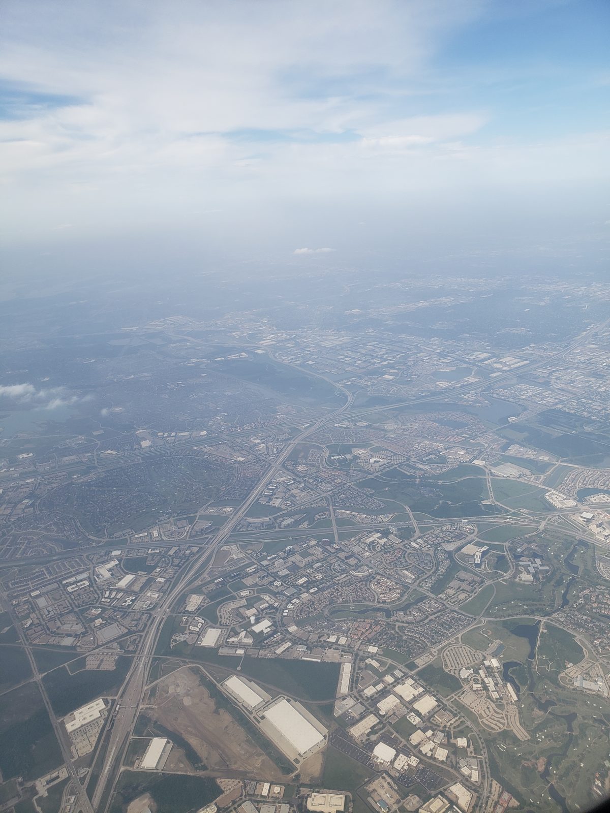 Farmland from the window, heading into Detroit